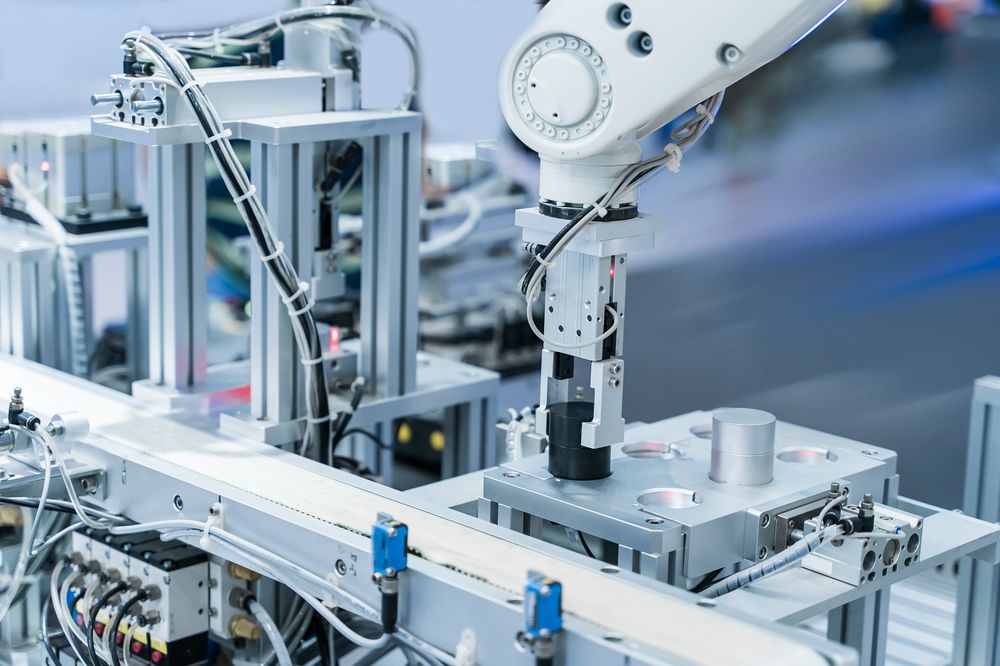 Automated machine tooling and fixturing cell